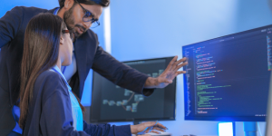 Business professionals collaborating with cloud productivity software and IT support