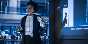 A lady leading a meeting for IT investments Review