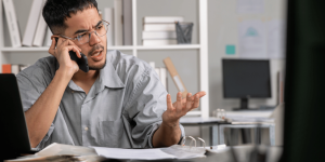 An Office manager talking over the phone